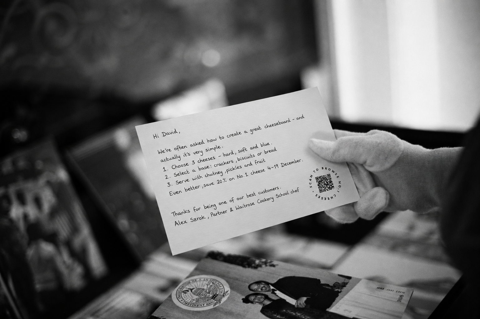 Waitrose personalised handwritten note held by a team member